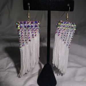 White assymetrical fringe earring pair